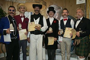 Die Weltmeister der Kategorie Schnauzb&auml;rte (vlnr.): Daniel Lawlor, Jonny King, Jaromi Zsolt, Patrick Fette, Jackie Lynn und Wolfgang Schneider.